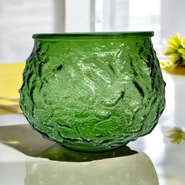True green round squatty glass vase in fun mid-century modern crinkle texture. Doubles well as a bowl or catch-all. By...