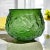 True green round squatty glass vase in fun mid-century modern crinkle texture. Doubles well as a bowl or catch-all. By...