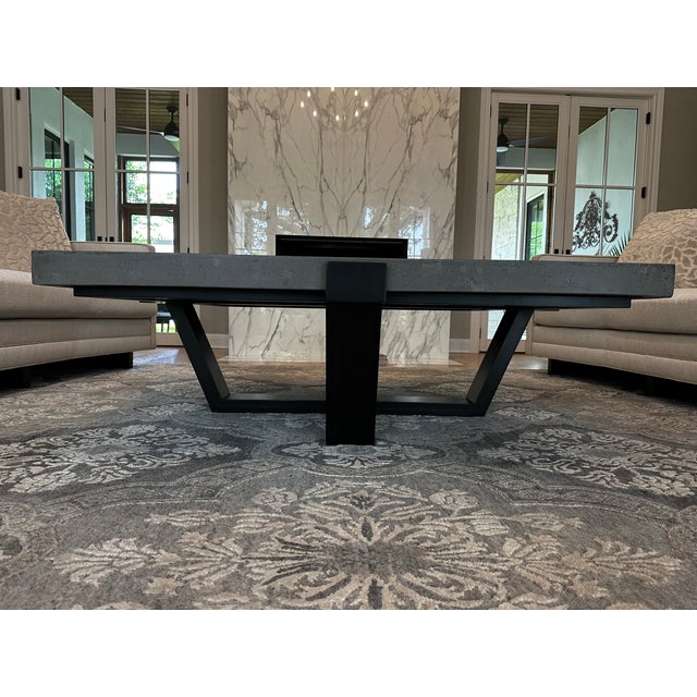 Modern concrete and wood coffee table. Table is 6 years old. Dark wood base contrasts with minimalist light weight...