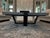 Modern concrete and wood coffee table. Table is 6 years old. Dark wood base contrasts with minimalist light weight...