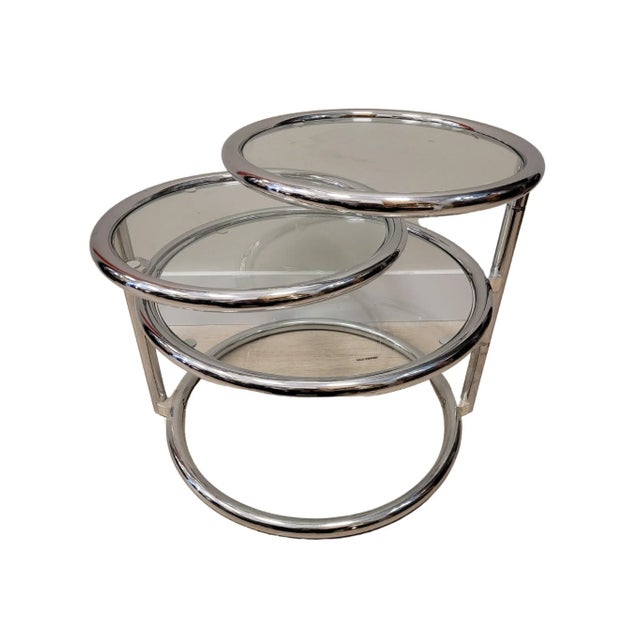 Coffee table of mid 20th Century modern design. Original design by Milo Baghman, tubular chromed metal structure and glass...