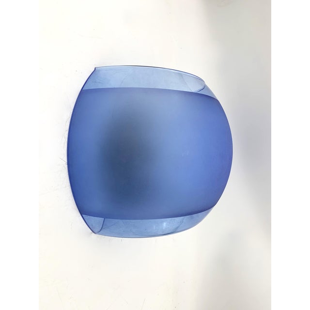 Fantastic pair of wall lights from the Sylcom company. Approximately 1990s. Blue colored glass and specifically darker...