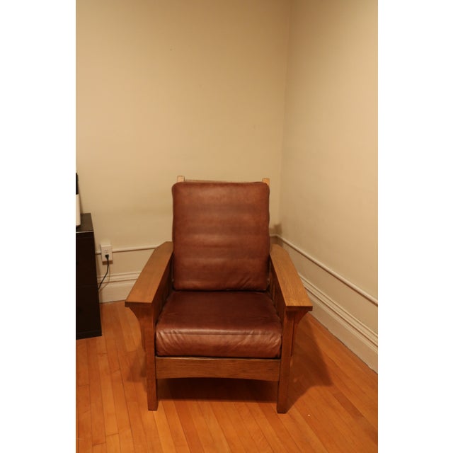 I purchased this Amish-made, quartersawn white oak recliner and ottoman in 2003 because it was comfortable but still fit...