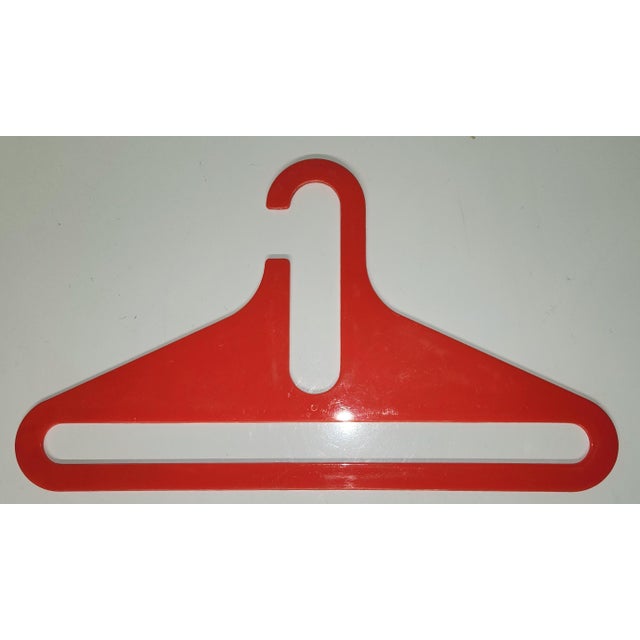 A set of 12 Mid-Century Modern Plastic Hangers. Style similar to Ingo Maurer hangers