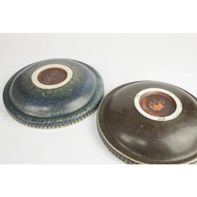 Two plates by Carl Harry Stålhane This piece is designed in the style of the selected designer and/or manufacturer