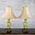 Marvelous vintage Italian pair of table lamps composed of pierced majolica urn shaped bodies with hand painted green...