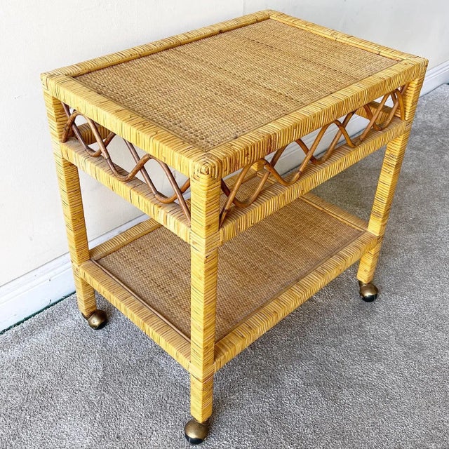 Amazing rattan cart with a wicker top and bottom tier. Cart glides smoothly on spherical wheels.