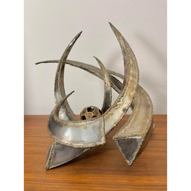 Brutalist Mid Century Mixed Metal Orb Sculpture signed by Monk 1975. A freeform mixed-metal piece with welded edge work in...