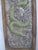 Chinese silver metal relief dragon panel, features detailed, silver-chased dragon with vibrant green enamel scales and...