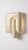 The smallest lamp in the collection, and often the first one people reach for. Its folded form hides the source entirely,...