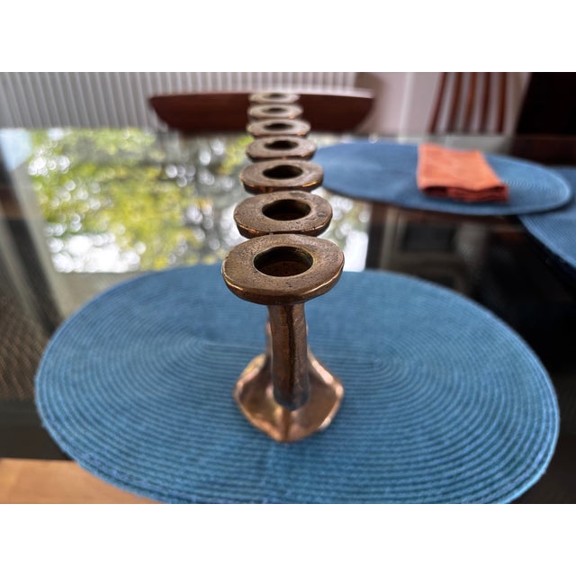 Beautiful solid bronze menorah in the Brutalist style, with organic shapes and considerable weight, in perfect condition....