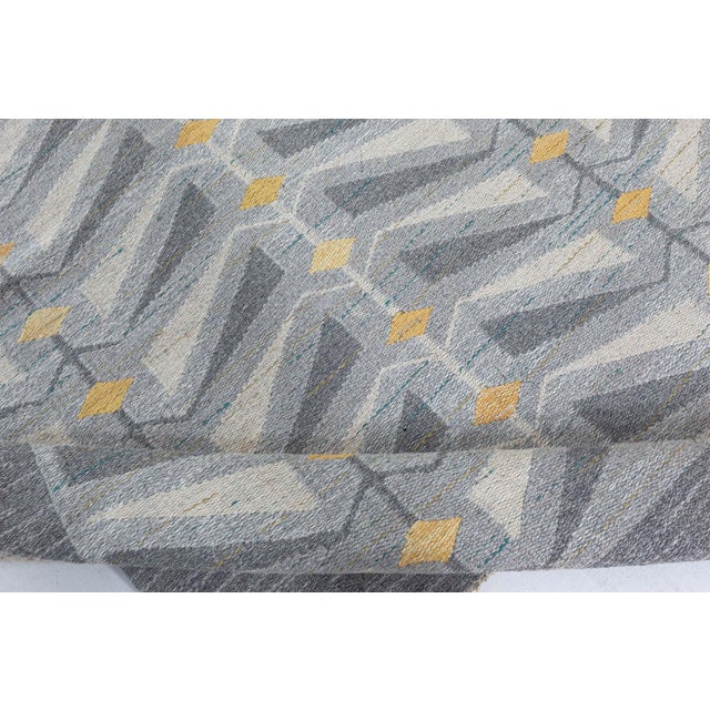 Vintage Swedish Flat-Weave Wool Rug, Signed VF-e-65 Size: 4'10" × 6'10" (147 × 208 cm) This remarkable vintage Swedish...