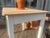 This charming antique side table has been given a fresh coat of paint, sanded, and oiled. Width: 64.5 cm Depth: 48 cm...