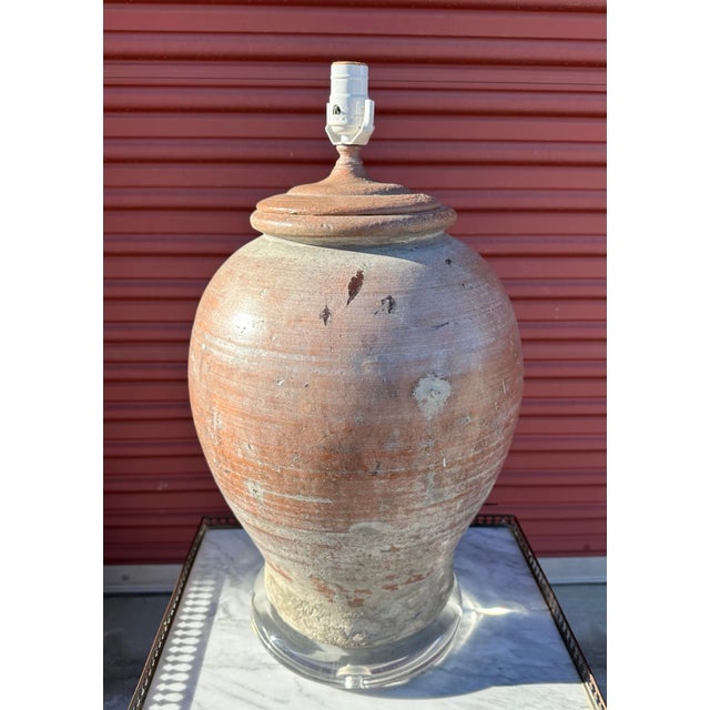Vintage large terra cotta table lamp with a lucite base. Wood finial w/harp. Perfect Rustic European look distressed with...