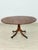 Beautiful vintage dining table from the 1960s in classic colonial style. The table impresses with its elegant shape, high-...