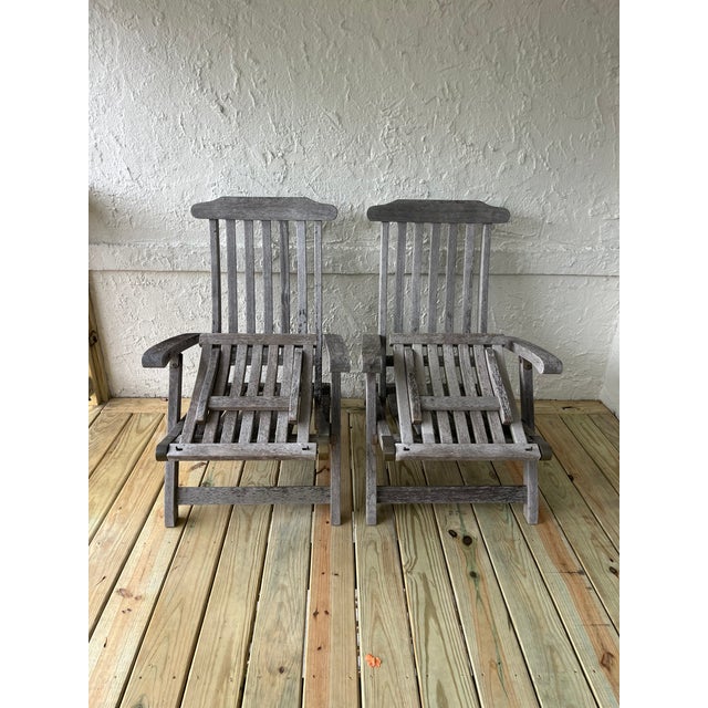Pair of Kingsley Bate teak outdoor steamer chairs, model ST65. These are premium grade and have adjustable backrests (4...