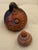 Magnificent Vintage Pair of Peruvian Mate Burilado Hand-Carved Storytelling Gourd Rattles Bring rich textures and global...