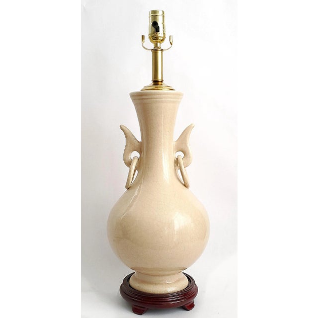 Offering a RESTORED Chinese porcelain table lamp, circa 1960s. This beautiful traditional Chinese lamp has a wonderful...