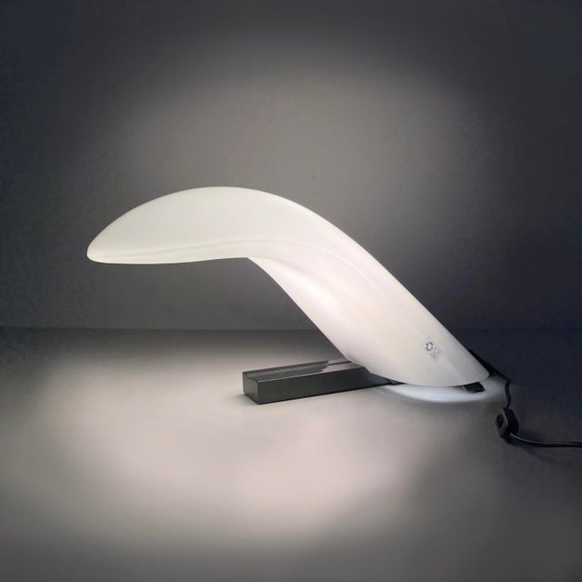 Italian modern opaline glass table lamp by Leucos, 1970s Table lamp with a round opaline glass diffuser. The base is made...