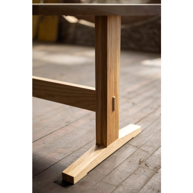 Indulge in the unique colors of urban ash wood. The oval top fits into a narrow breakfast nook or by the setting of a...