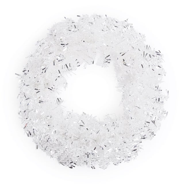 Shimmer, sparkle, and celebrate the season with this dazzling Silver Tinsel Christmas Wreath. Designed to catch the light...