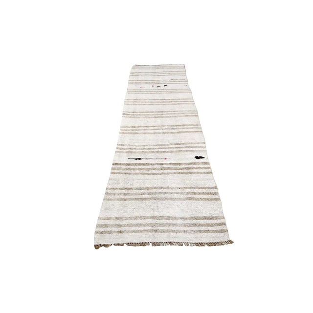 Handwoven vintage hemp kilim rug from Yozgat region of Turkey. Approximately 45-55 years old. In very good condition.