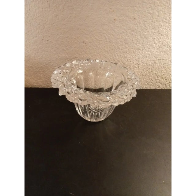 GORGEOUS MERRY CHRISTMAS 6" crystal votive candle holder with Wreath Rim. This 6" crystal votive candle holder is a...