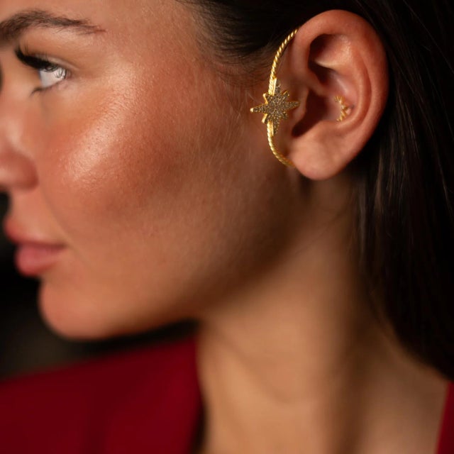 Shine with celestial elegance with our North Star Sparkle Gold Vermeil Unique Ear Cuff. Handcrafted with love, this one-...