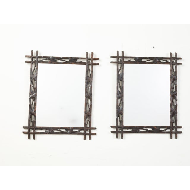 Rustic Black Forest 1900s Mirror with Carved Vine Motifs and Intersecting Corners For Sale - Image 3 of 7