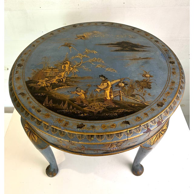 Wonderful hand painted pine table in the loveliest shade of blue with highly detailed gold decoration depicting charming...