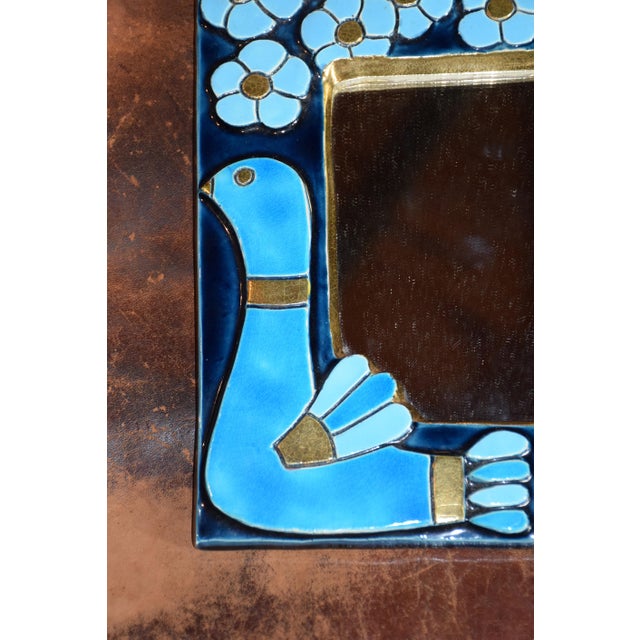 A stunning bird mirror by Mithé Espelt, a model created in 1970 that became iconic in her work. A catalogued design, it...