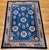 A beautiful mid-20th century Art Deco Chinese rug featuring a serene French blue background of calm, sky-like depth,...