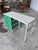 Steel frame mid century modern desk by George Nelson for Herman Miller, featuring newly lacquered drawers in a kelly green...