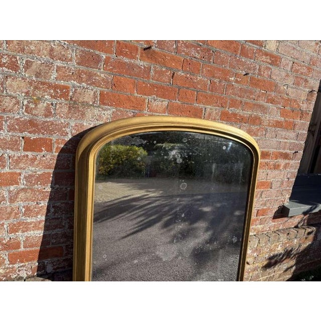 A Stunning large Antique English 19th Century carved wood & gesso arched top gilt Overmantle Mirror, with original mirror...