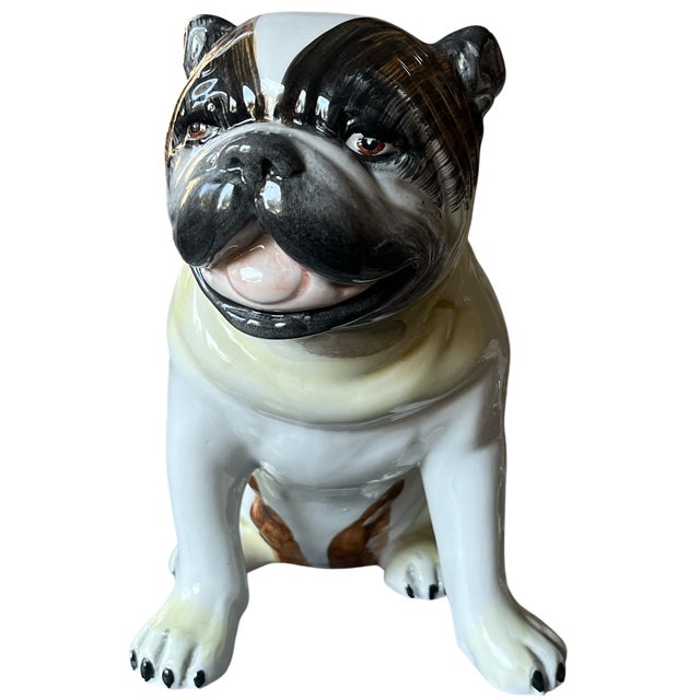 A wonderfully expressive Staffordshire porcelain pug, capturing the endearing personality and stout elegance that have...
