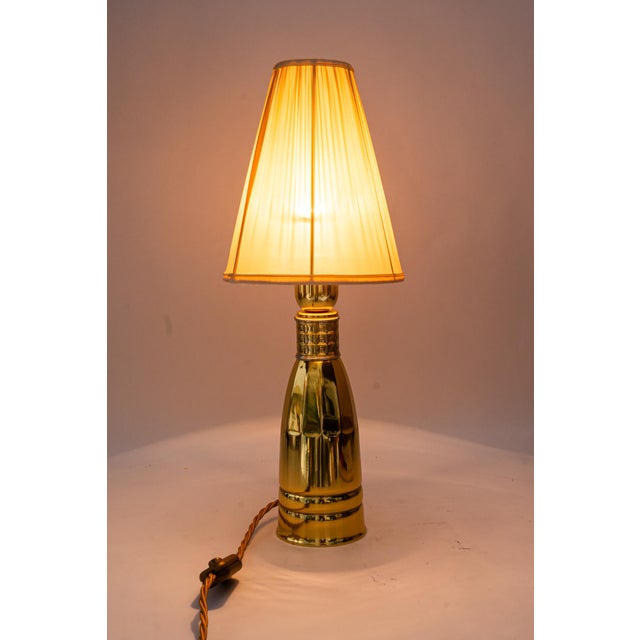 Art Deco Table lamp with fabric shade vienna around 1920s Brass polished and stove enameled Fabric shade is replaced ( new...