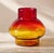Offering a large blown glass foot vase. Introduce a burst of color to your space with this exquisite blown glass vase....