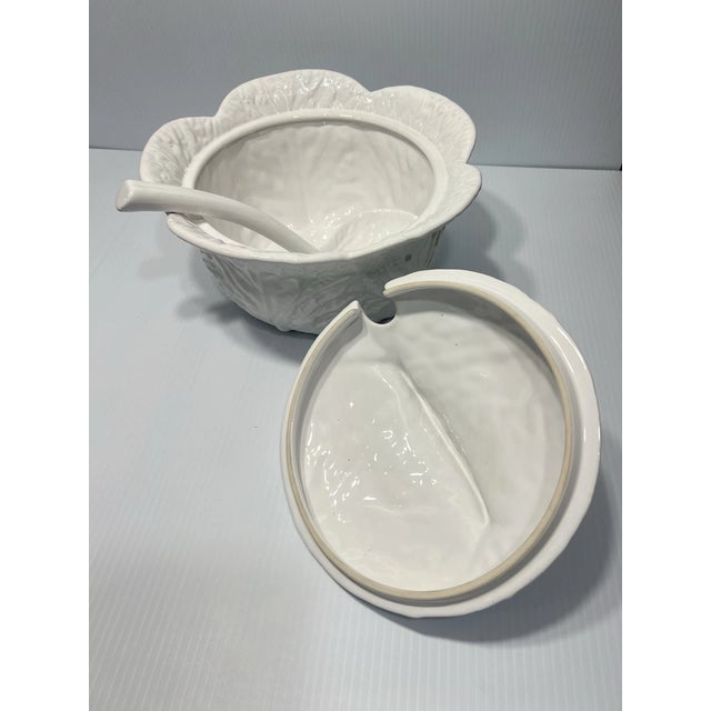 Add timeless European-inspired charm to your table with this **Vintage MCM White Ceramic Majolica Cabbage Soup Tureen**....