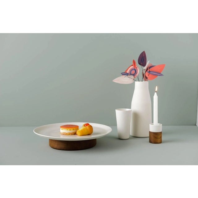 Elegant glass with defined and sober shapes. The inclined sides allow the stackability and the thin and glazed glazed...