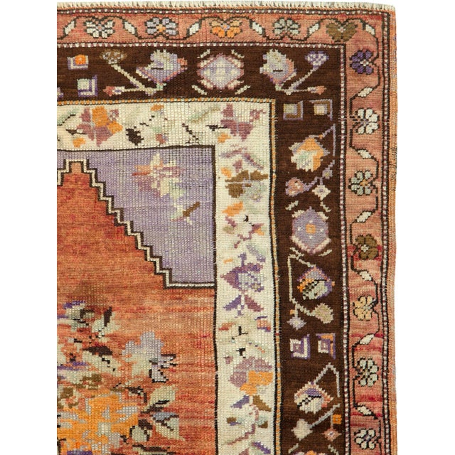 A vintage Turkish Anatolian carpet from the second quarter of the 20th century. Measures: 3' 5" x 4' 8"