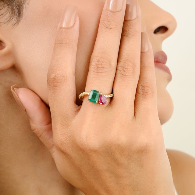 Emerald Ruby Toi et Moi Wedding Ring with Diamonds in 14K Gold featuring natural emerald and ruby of 1.81 carats and...