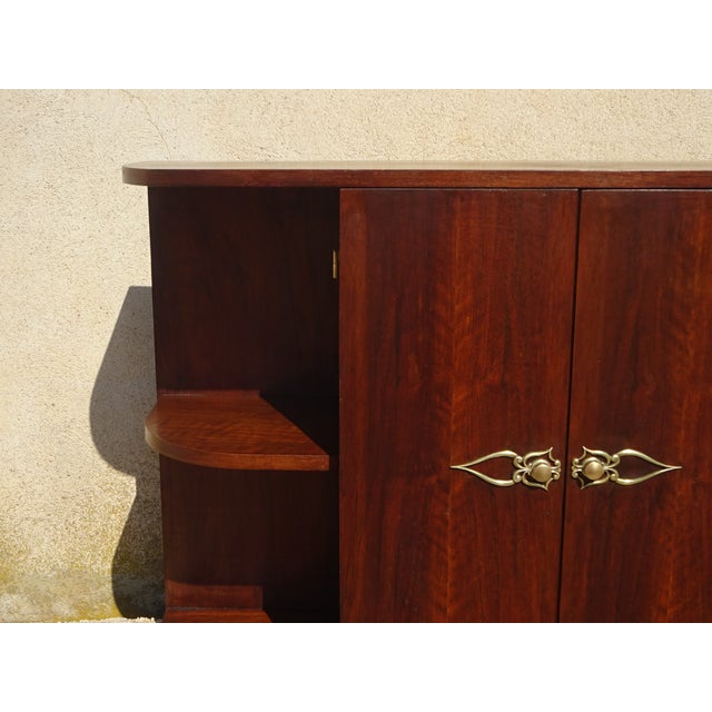 Charming small storage unit in a superb Art Deco style (1940s-1950s). Structure: Solid wood covered with a beautiful...