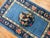 Stunning sky blue and ivory, navy accent full pile condition antique Chinese Peking rug, circa 1920. Floral border with...