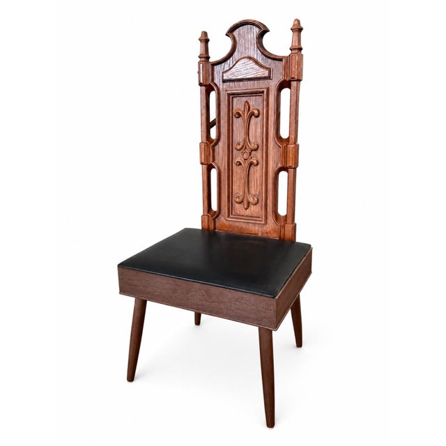Rare vintage Pearl-Wick gentleman’s valet chair featuring a beautifully carved Spanish Revival high back, hidden lift-top...