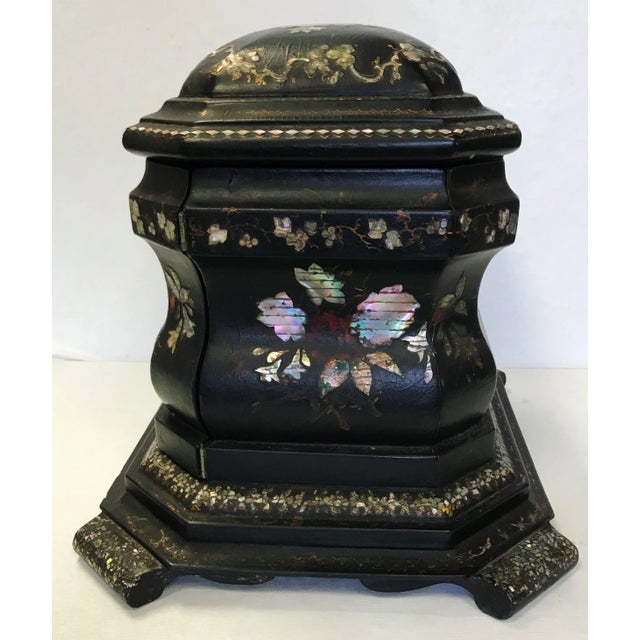 Wow!This 19th century jewelry box is exquisite!It's Made Of papier mâché with a black lacquered finish.The exterior is...