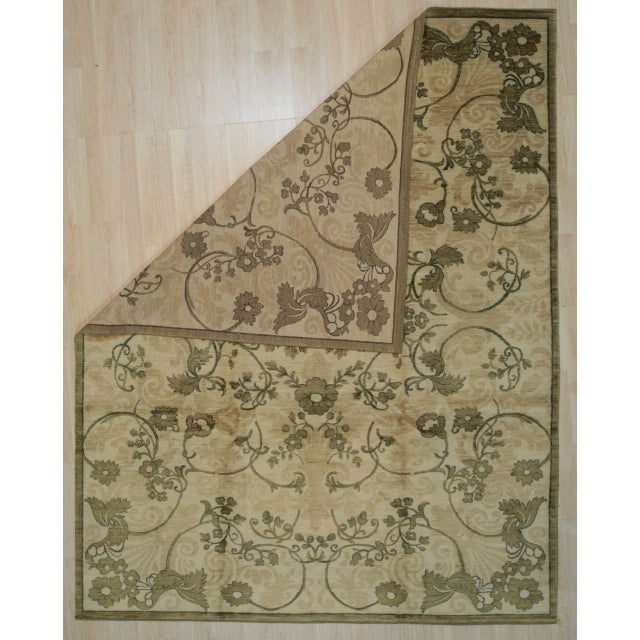 Elena Ophelia Ivory Hand Knotted Afghan Wool Rug, Country of Origin: India. This exquisite piece showcases a refined,...