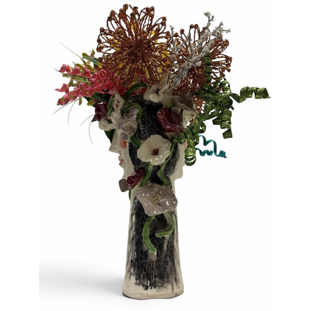 Infuse your space with bold, expressive personality and Maximalist style with this unique avant-garde sculptural ceramic...