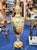 Bring timeless European elegance to your home with this exquisite decorative porcelain vase, featuring a luminous white...