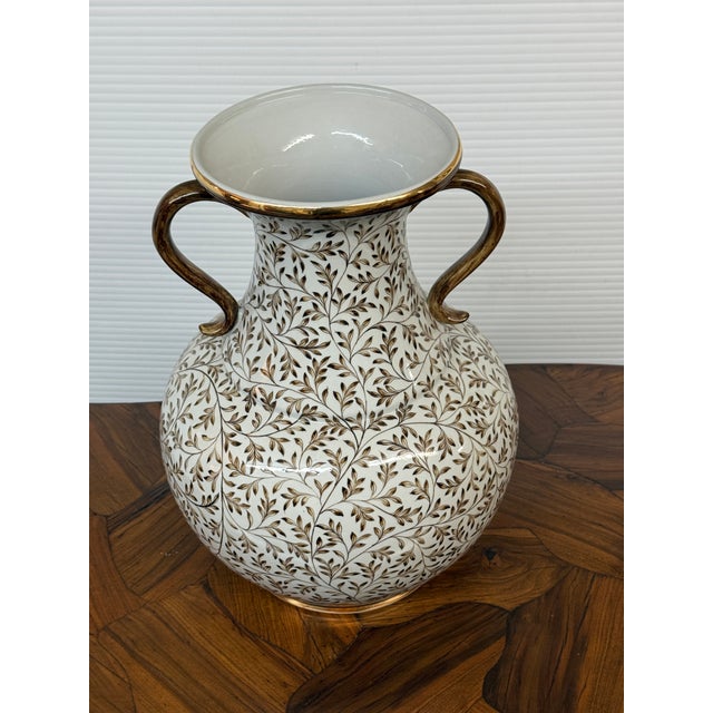 Design Plus Gallery presents a Vintage Hand-Painted Double-Handled Porcelain Urn Vase from Maitland-Smith. This decorative...