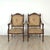 A pair of Louis XVI–style walnut/beech part gilt armchairs with aubusson tapestry upholstery. Seat height 16.5".